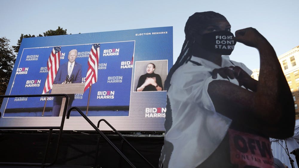 Democratic presidential nominee and former Vice President Joe Biden is seen speaking on a giant screen during a watch party of the results of the presidential election near the White House on Nov. 4 in Washington, D.C., the day after the general election.