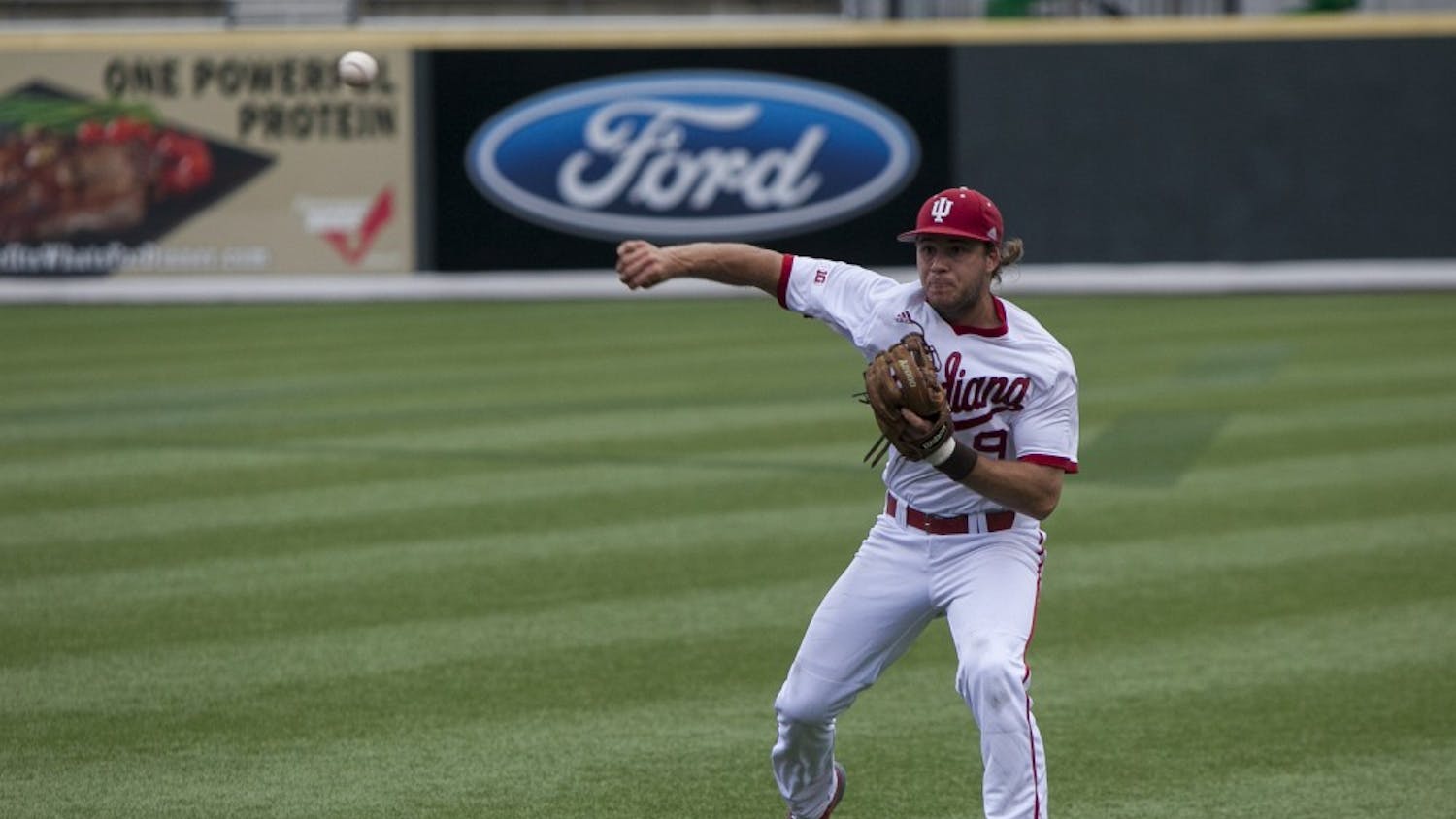 Senior second baseman Casey Rodrigue makes a throw on Sunday at Hawkins Field in Nashville, Tennessee. Indiana lost 5-3 to Radford in the elimination game of the NCAA Regional.