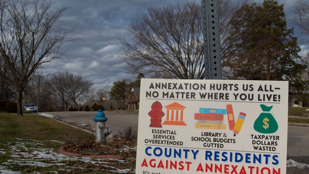 A sign protesting possible annexation is seen Jan. 28, 2023, on the corner of Sheridan Road and Maxwell Lane. Many residents living in areas that would be annexed do not support the plan.