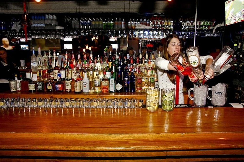 Bar Manager Jessica Saylor pours a drink Nov. 8 at Kilroy’s Sports Bar.