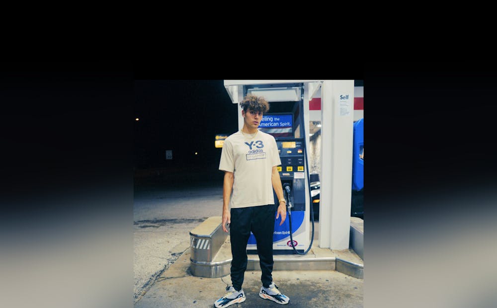 <p>Bloomington native Braydon “Brayke&#x27;&#x27; Elgar poses for a photo in front of a gas pump. In 2021, a producer reached out to Elgar on social media giving him the opportunity to star in season two of HBO Max’s reality dating show “FBOY Island.” </p>