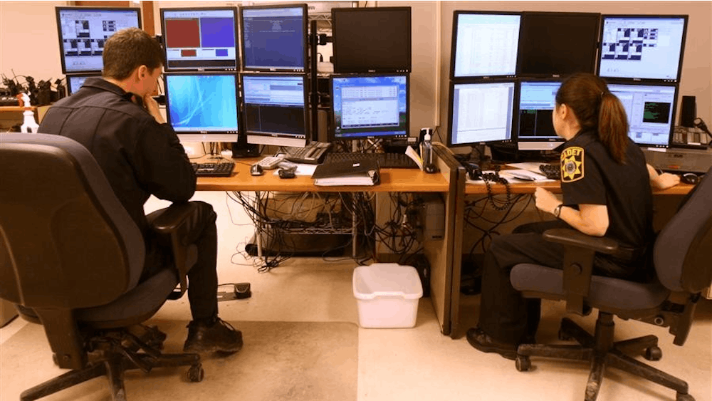 Former IU Police Department cadets Brad Begeske and Amanda Stahl wait for 911 emergency calls for dispatch. Monroe County Central Emergency Dispatch Center workers voted in favor to unionize on Jan. 17, 2023. 