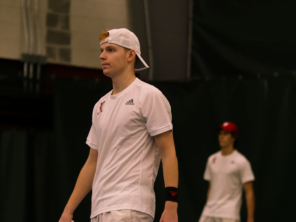 Then-sophomore Ilya Tiraspolsky plays in a doubles match against Toledo University Jan. 22, 2022, at the IU Tennis Center.﻿