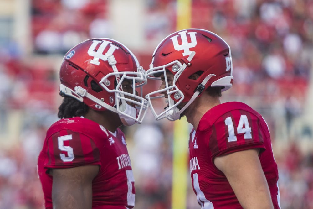 <p>Graduate running back Stephen Carr and then junior quarterback Jack Tuttle celebrate Carr&#x27;s touchdown Oct. 16, 2021, at Memorial Stadium. IU&#x27;s first game of the season will be on Sept. 2, 2022 against Illinois. </p>
