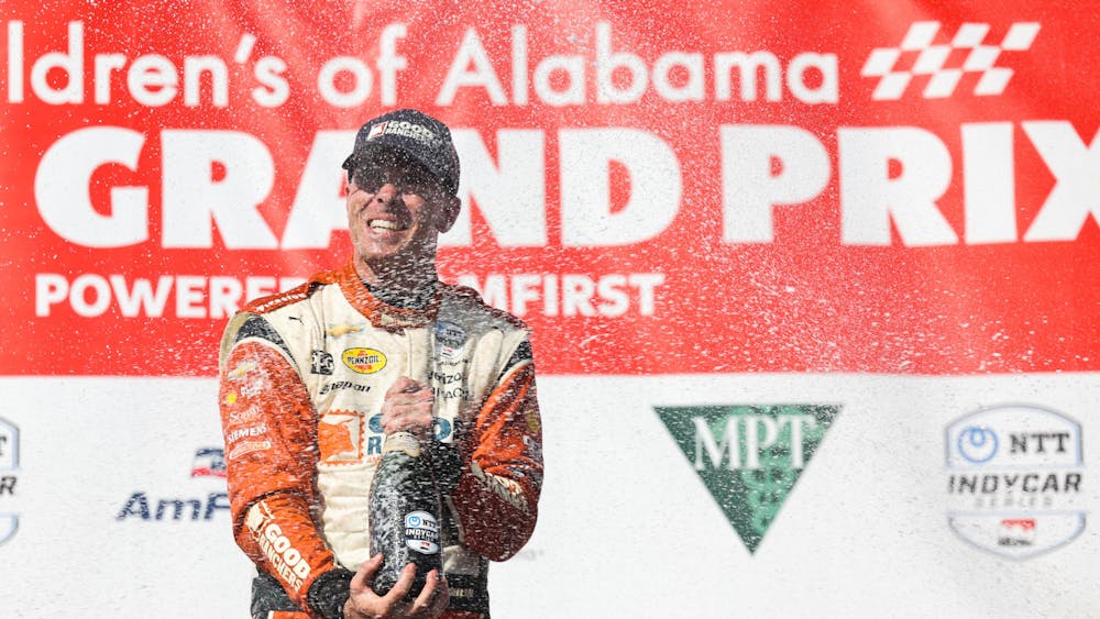 Team Penske’s Scott McLaughlin celebrates winning the Children&#x27;s of Alabama Indy Grand Prix May 1, 2023, at Barber Motorsports Park in Birmingham, Alabama.