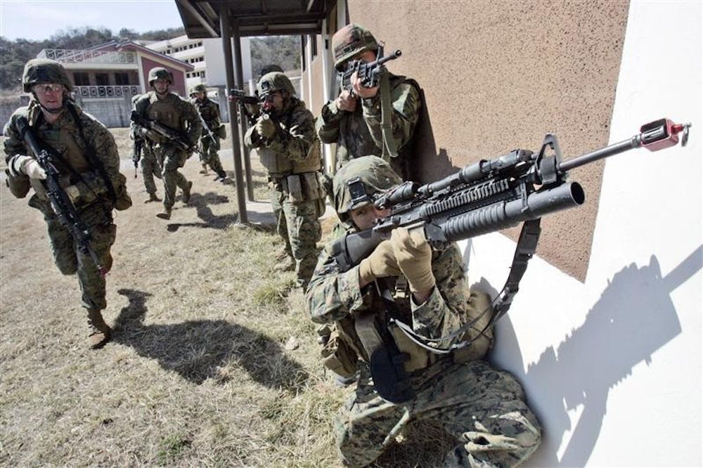 U.S. and South Korean Marine soldiers conduct a Force-on-Force drill during the joint U.S.-South Korean military exercises Key Resolve/Foal Eagle 2009 at Rodriguez Range in Pocheon, north of Seoul, South Korea, Tuesday. North Korea put its troops on alert and cut the hot line Monday as the American and South Korean militaries began joint maneuvers. The communist regime warned that even the slightest provocation could trigger war during the 12-day drills. 