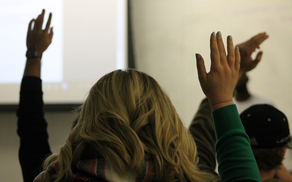 Members of the IUSA congress vote on a bill. The bill concerned expanding the campus safety escort service.