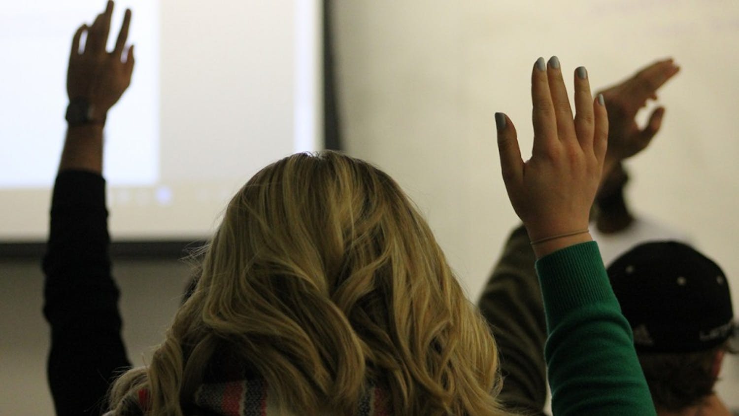 Members of the IUSA congress vote on a bill. The bill concerned expanding the campus safety escort service.