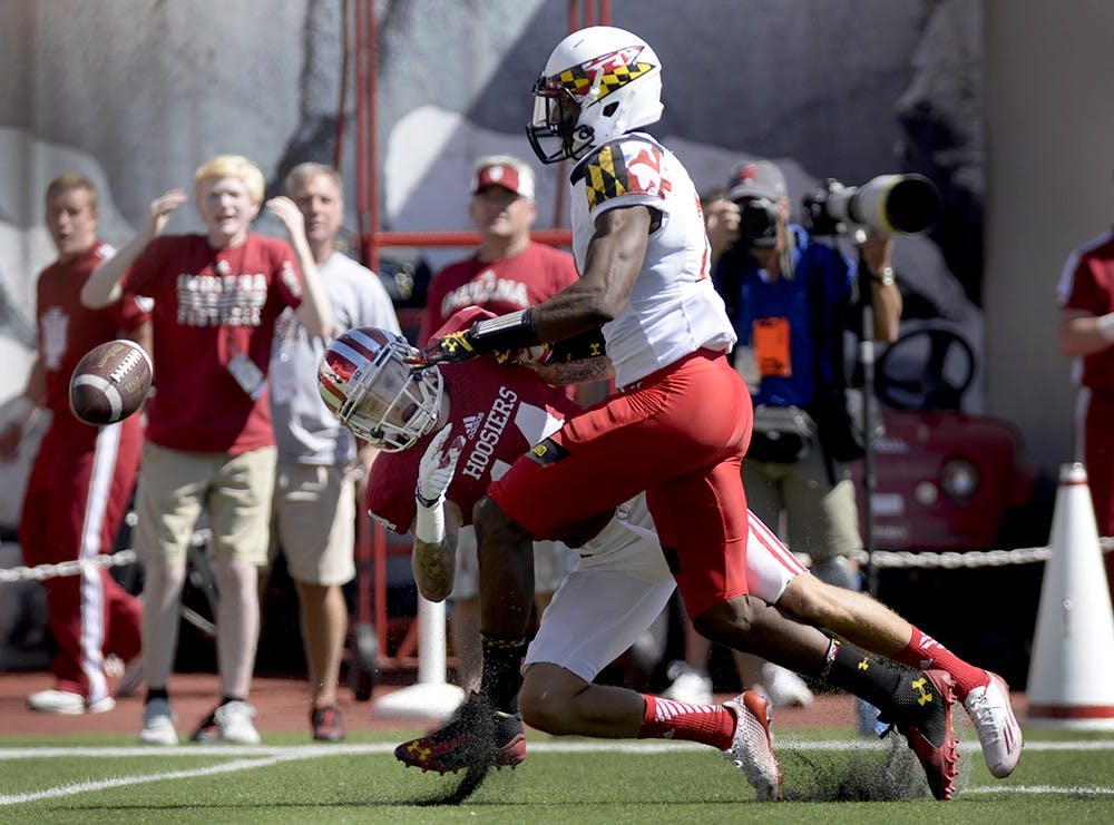 Senior Nick Stoner tries to make a catch during IU's game against Maryland on Saturday at Memorial Stadium. IU lost to the Terrapins, 37-15.