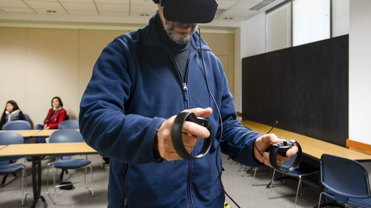 Lweis Rifkowitz, an artist, draws in a three dimensional room with virtual reality headsets named Rift Oculus on Sunday at Monroe Country Public Library. "I love It!" Rifkowitz said.