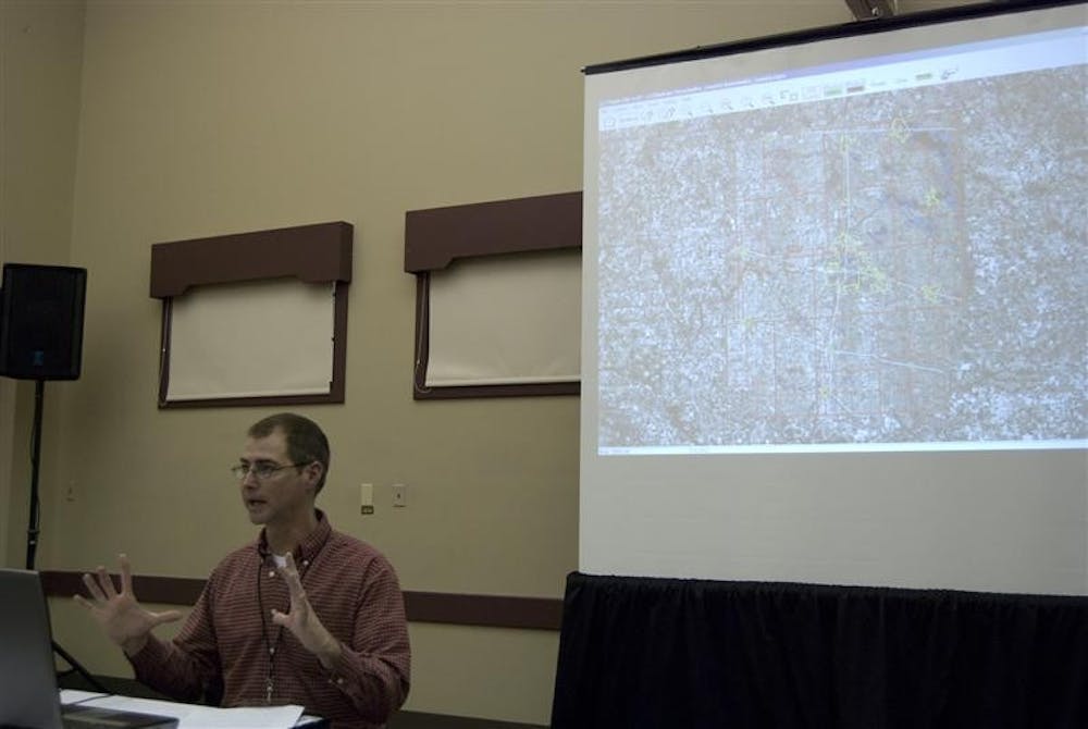 Kosciusko County Geographic Information System director Bill Holder shows a map of the Fort Wayne area Wednesday afternoon at the Monroe County Convention Center. Holder's presentation on ArcGIS and ThinkGIS systems was the last of the two-day Indiana GIS Conference.
