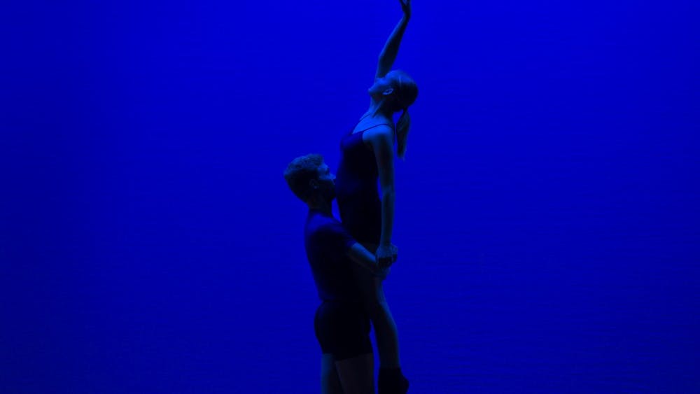 A dancer is lifted by a dancer Wednesday during “Ballet at the BCT” in the Buskirk-Chumley Theater. The dance was called, “Winter Sun,” written by Bradley Streetman.