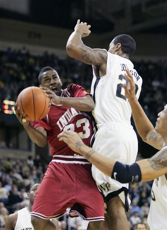 Junior guard Devan Dumes goes up for a basket during the first half of IU's game on Wednesday night at Wake Forest in Winston-Salem, N.C.