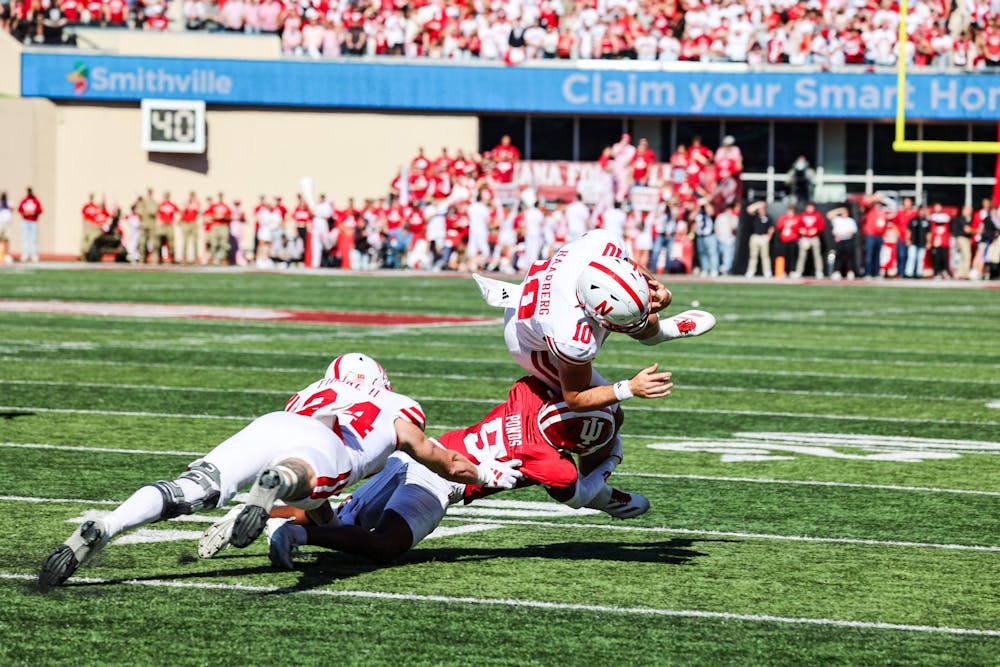 Sophomore D'Angelo Ponds tackles a Nebraska player in their game on Oct. 19, 2024 at Memorial Stadium in Bloomington. This is Ponds' first season player for Indiana.