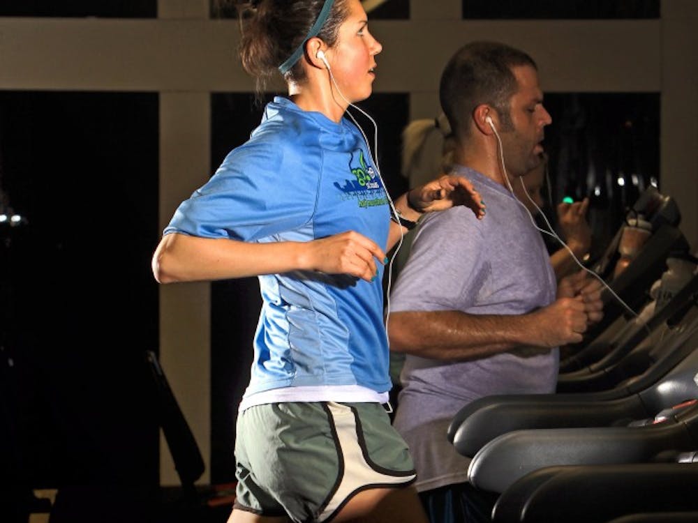 Kalei Lowes runs a 45-minute routine on a treadmill at St. Louis Workout in the Central West End on Friday, February 25, 2011. Lowes says she runs outdoors year round as much as possible. (Christian Gooden/St. Louis Post-Dispatch/MCT)