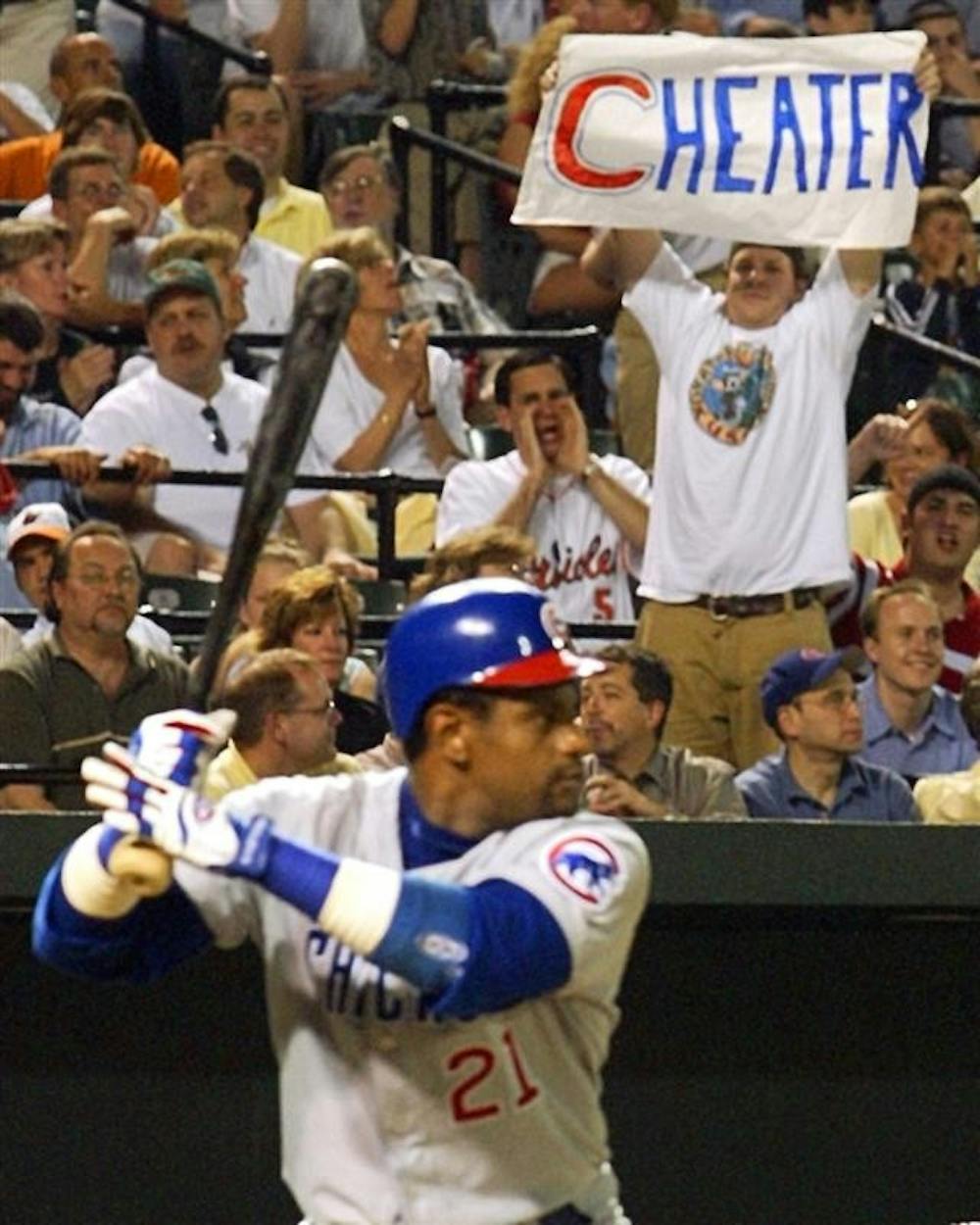 In this June 10, 2003 file photo, fans make their feelings known as Chicago Cubs' Sammy Sosa bats in the eighth inning of a baseball game against the Baltimore Orioles at Camden Yards in Baltimore. The New York Times reported on its website Tuesday, June 16, 2009, that Sosa tested positive for a performance-enhancing drug in 2003, citing lawyers familiar with the case. The newspaper did not identify the drug. 