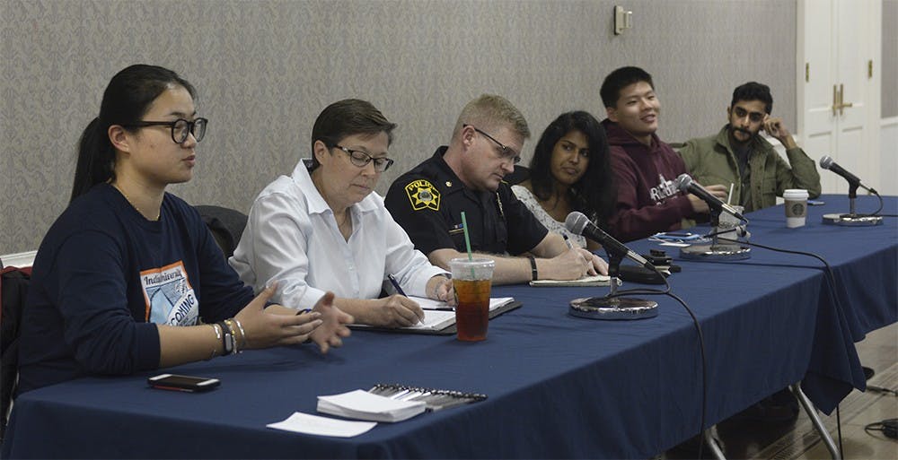 Qiuyao Wei, left, talks about her experience regarding interacting with students during her freshman year at IU during the International Student Policy Panel Wednesday evening at the IMU Georgian Room. This panel, organized by Project PengYou, brought different perspectives and ideas on how to bridge culture gaps to help international students. 