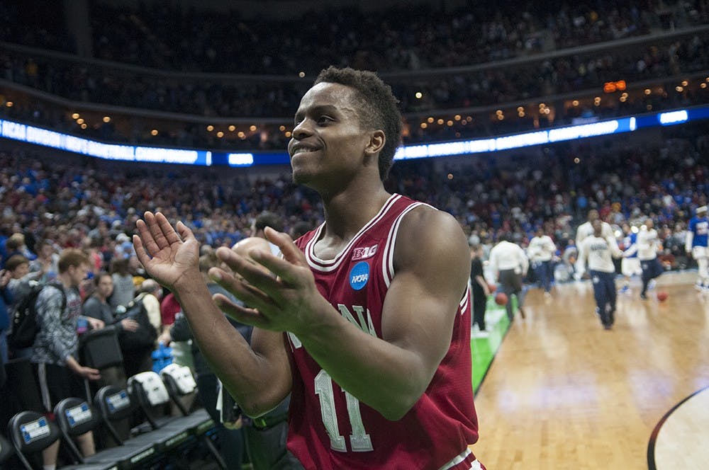 Senior guard Yogi Ferrell walks off the court after defeating Kentucky in the second round of the NCAA Tournament on Saturday at the Wells Fargo Arena in Des Moines, Iowa. The Hoosiers won 73-67.