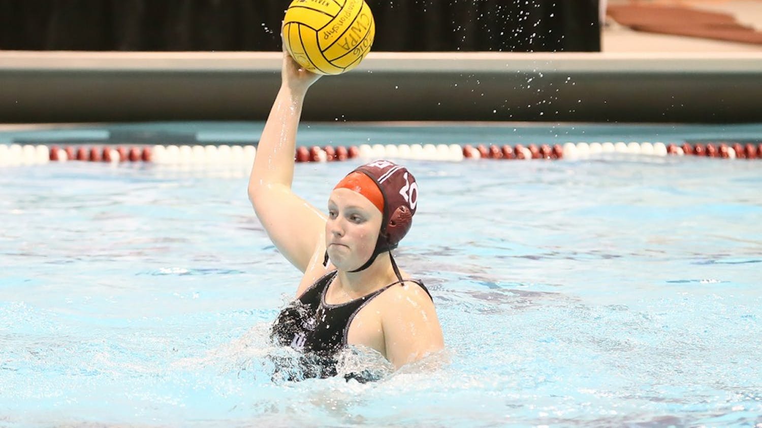 Then-junior Bronwyn Smith handles the ball in last year's CWPA Championship game against Michigan on April 30, 2016. Smith is now IU's lone senior and scored a hat trick on senior night on Friday.
