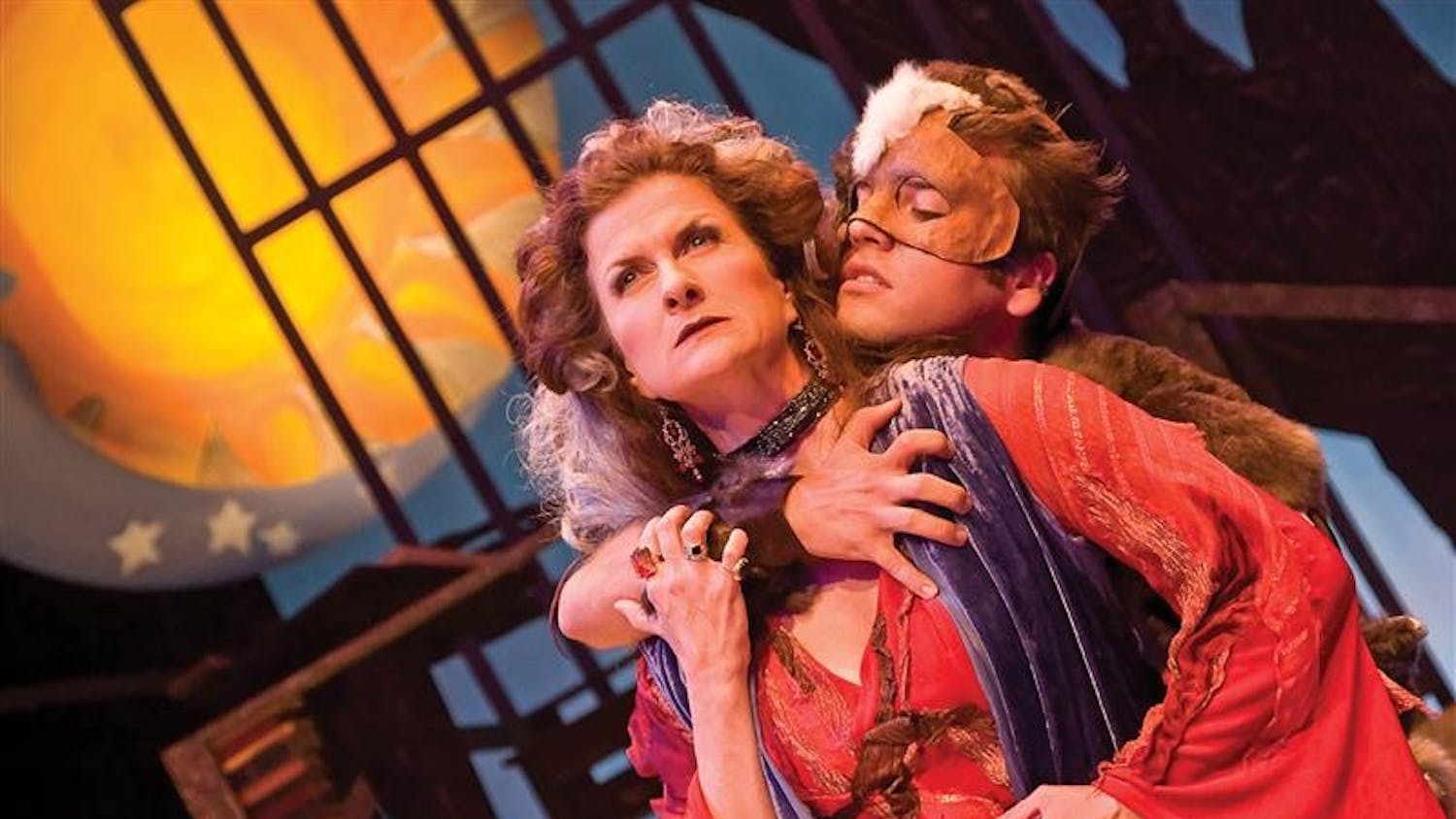 Actress Tina Stafford (Watho) and junior William Angulo (Wolf) pose for a publicity photo before their rehearsal for the musical “The Day Boy and the Night Girl” on Monday evening at the Wells-Metz Theartre. The show will run at 7 p.m. Thursday through Saturday and at 2 p.m. Sunday.