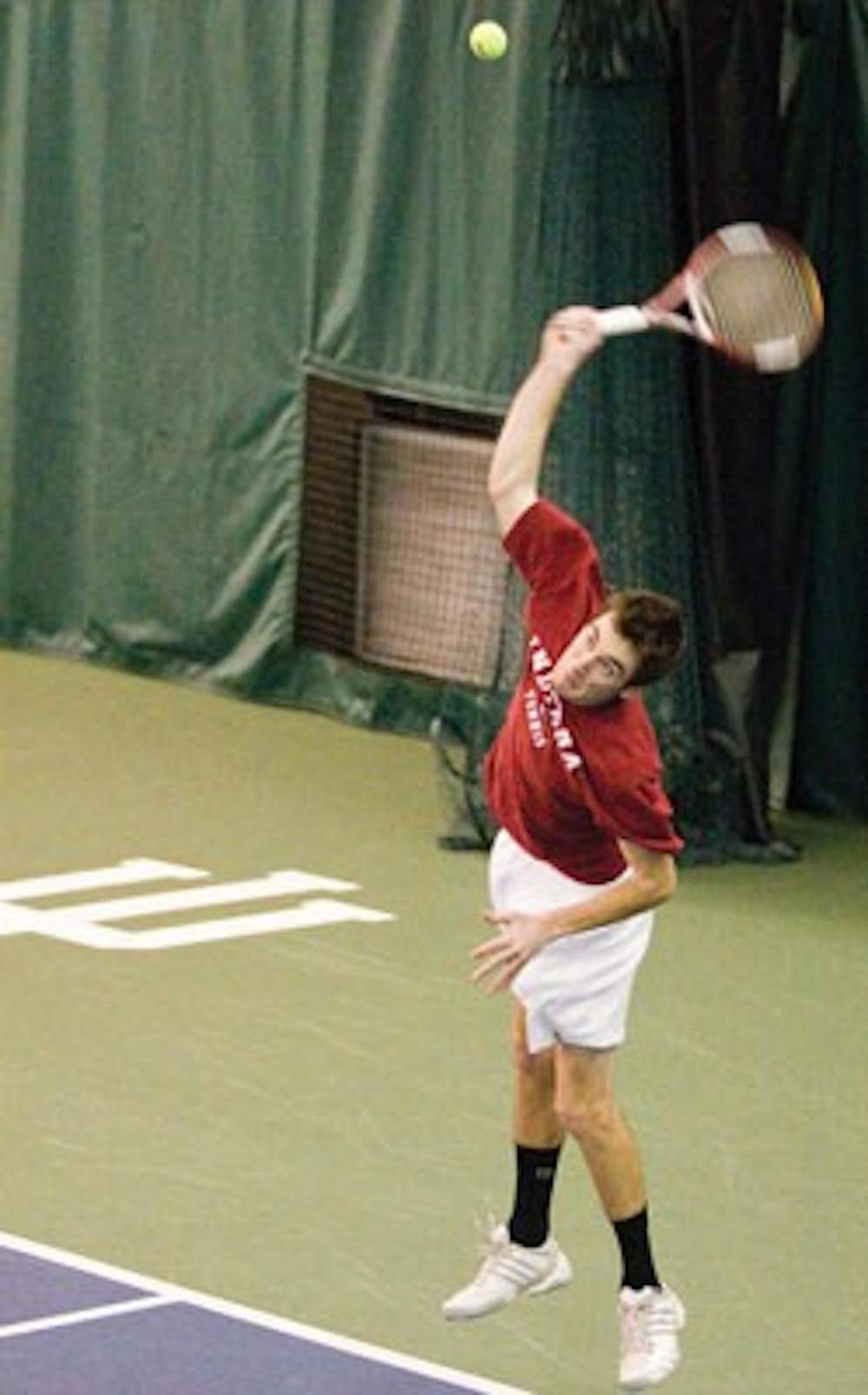 Junior Dara McLoughlin serves a ball during a Jan. 20 game against Murray State in the IU Tennis Center.  The Hoosiers face Minnesota and Iowa this weekend.