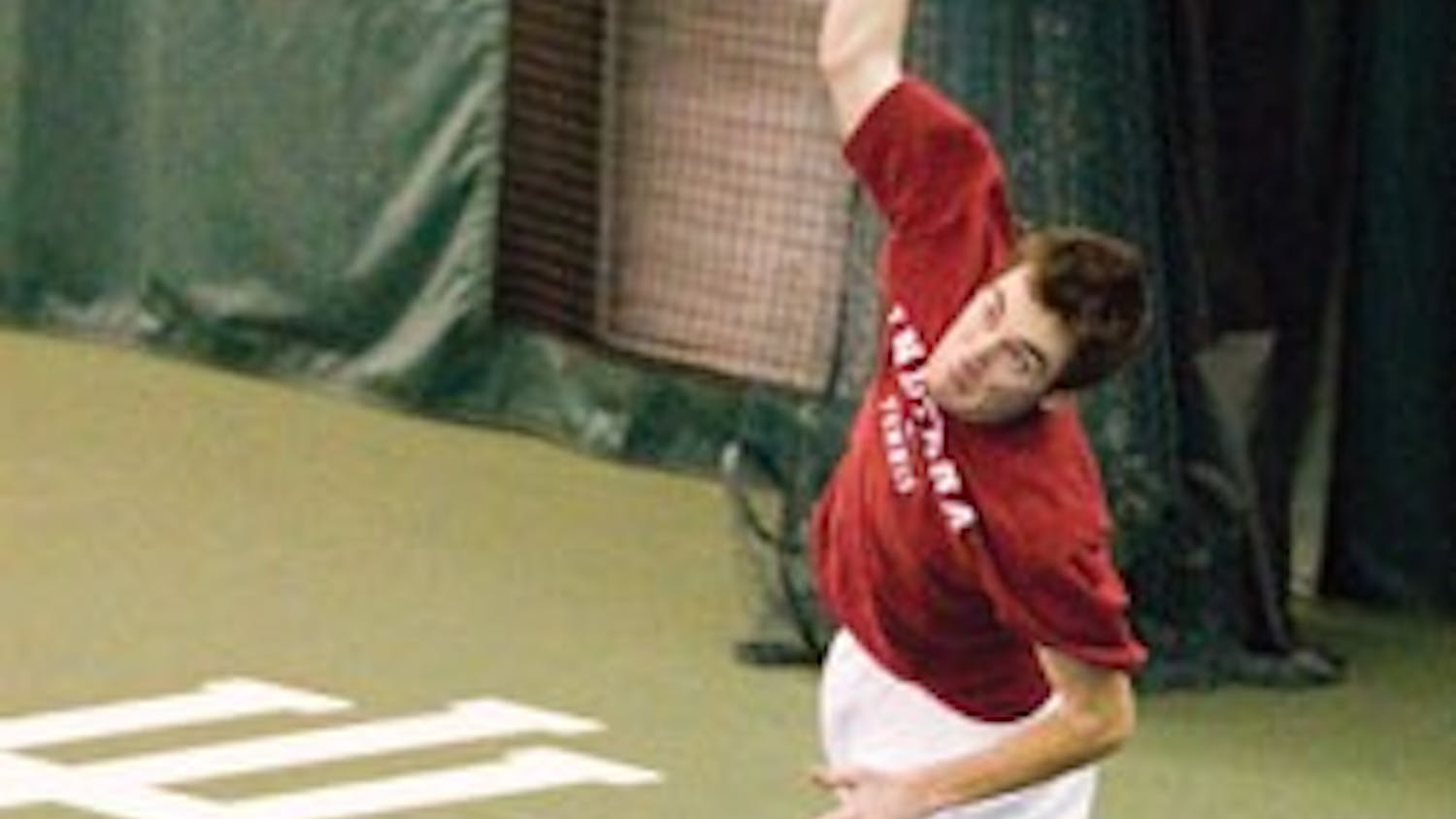 Junior Dara McLoughlin serves a ball during a Jan. 20 game against Murray State in the IU Tennis Center. The Hoosiers face Minnesota and Iowa this weekend.