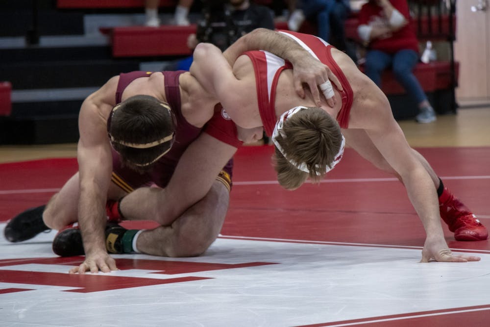 <p>Then-redshirt freshman Graham Rooks takes on Minnesota wrestler Brayton Lee Feb. 2, 2020, at Wilkinson Hall. Rooks went 1-1 Saturday for the Hoosiers in his first matches of the season, losing against Northwestern and winning his match against Penn State.  </p>