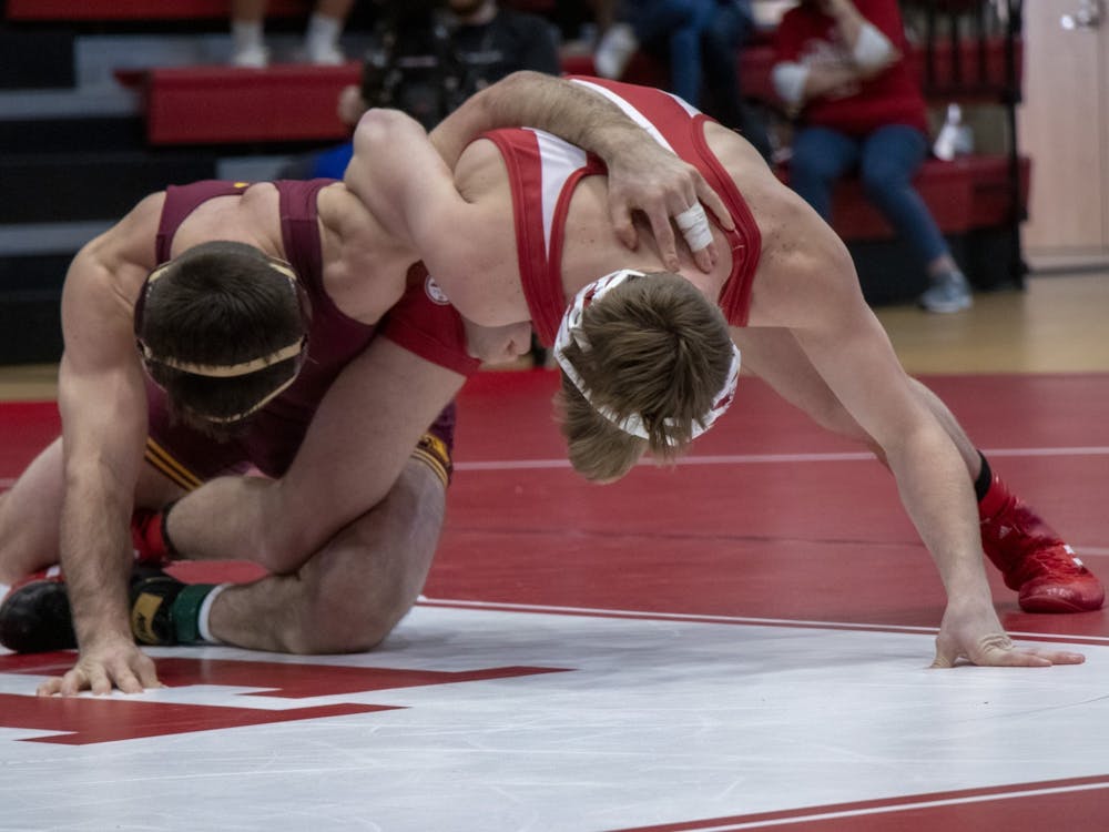Then-redshirt freshman Graham Rooks takes on Minnesota wrestler Brayton Lee Feb. 2, 2020, at Wilkinson Hall. Rooks went 1-1 Saturday for the Hoosiers in his first matches of the season, losing against Northwestern and winning his match against Penn State.  