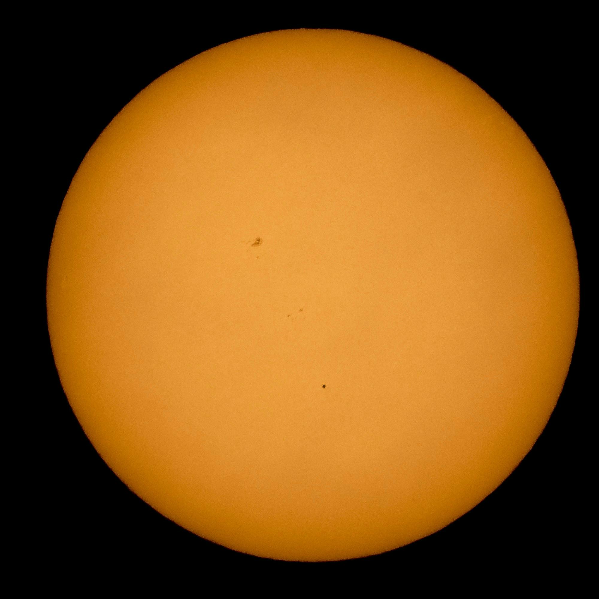 The planet Mercury is seen in silhouette from Boyertown, Pennsylvania, as it transits across the face of the sun May 9, 2016.