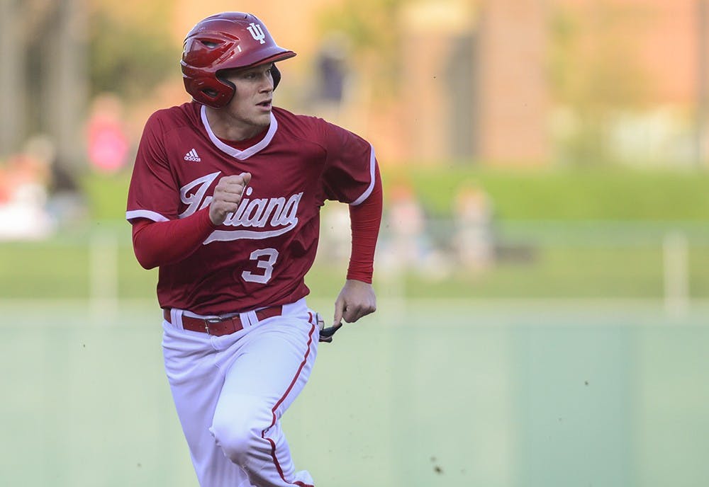 Senior Scott Donley rounds third base on his way to score during IU's game against Notre Dame on Tuesday at Victory Field in Indianapolis.