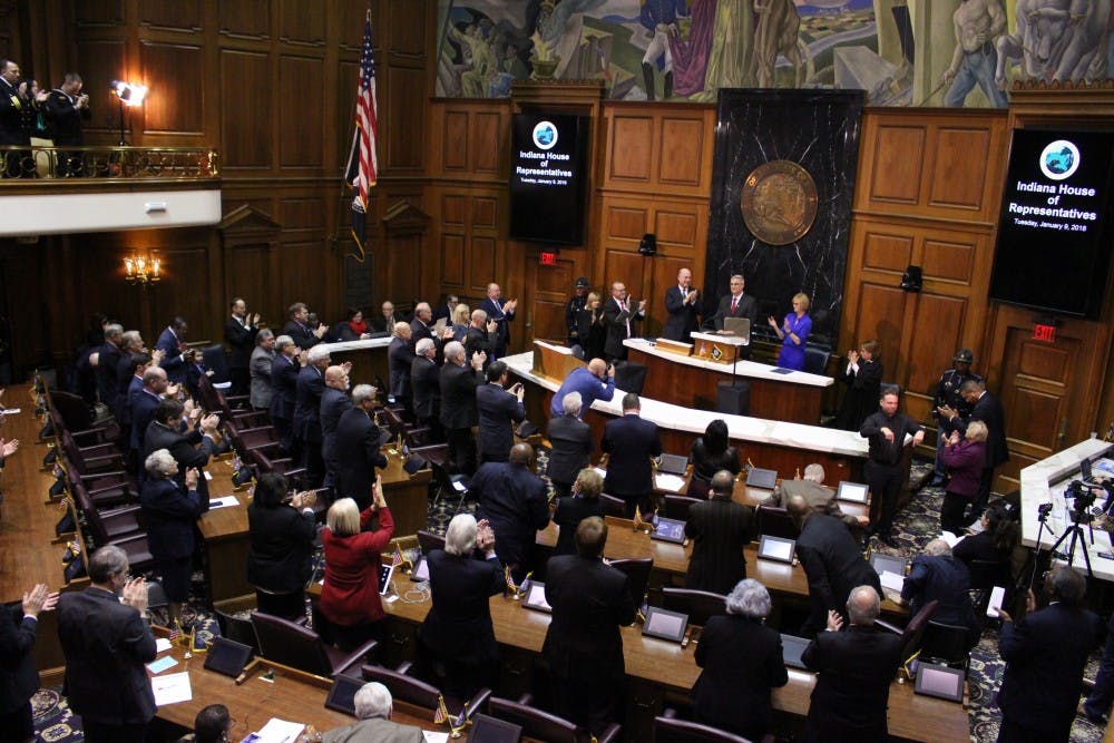 The members of the Indiana General Assembly stand up and cheer as Gov. Eric Holcomb finishes his State of the State speech. Holcomb's thirty-minute speech introduced his goals for the state this year.