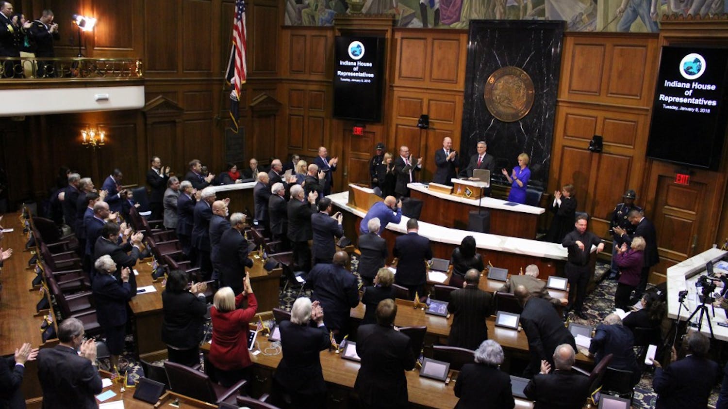 The members of the Indiana General Assembly stand up and cheer as Gov. Eric Holcomb finishes his State of the State speech. Holcomb's thirty-minute speech introduced his goals for the state this year.