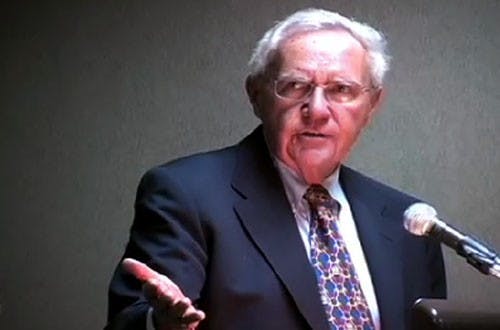 IU Chancellor Ken Gros Louis moderates an Indiana University Student Association debate Wednesday at the Indiana Memorial Union