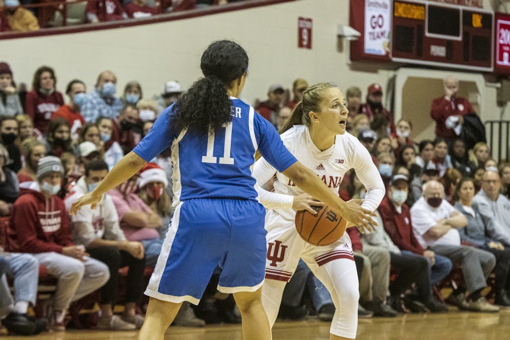 <p>Graduate guard Nicole Cardaño-Hillary looks to pass the ball Nov. 14, 2021 at Simon Skjodt Assembly Hall. Cardaño-Hillary had sevem assists in the win against Kentucky Sunday.</p>