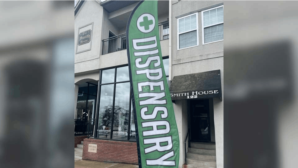 The dispensary sign outside of Hope&#x27;s Organics is pictured. Multiple cannabis businesses have opened up around Bloomington in the last few years.