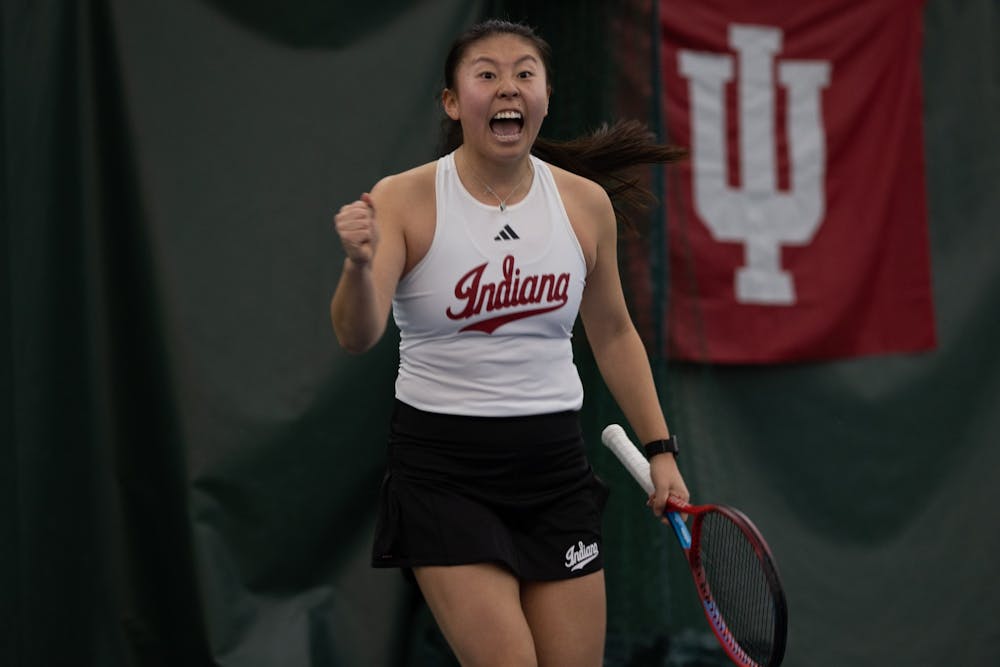 <p>Junior Xiaowei &quot;Rose&quot; Hu celebrates after hitting a winner in her doubles match against Northwestern University. March 5, 2023, at the IU Tennis Center. On Friday, the Hoosiers go on the road to face off against Nebraska.</p>