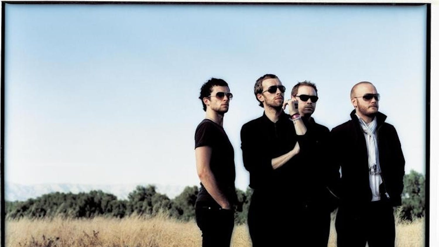 The members of Coldplay are badasses, but not too badass to stand in a prairie.