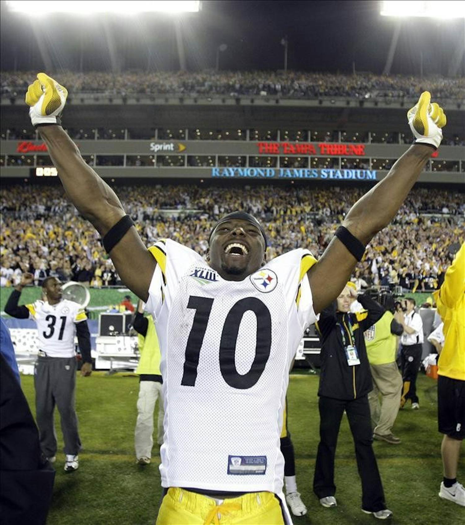 Pittsburgh Steelers wide receiver Santonio Holmes celebrates following Pittsburgh's 27-23 win over the Arizona Cardinals in the NFL Super Bowl XLIII football game, Sunday, Feb. 1, 2009, in Tampa, Fla. Holmes caught the game-winning touchdown pass.