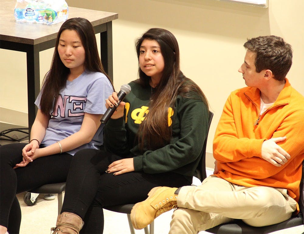 Anahy Mayorga, middle, from the Omega Phi Beta Multi-Cultural Greek Council (MCGC), talks about the roles of MCGC at IU on Wednesday.
