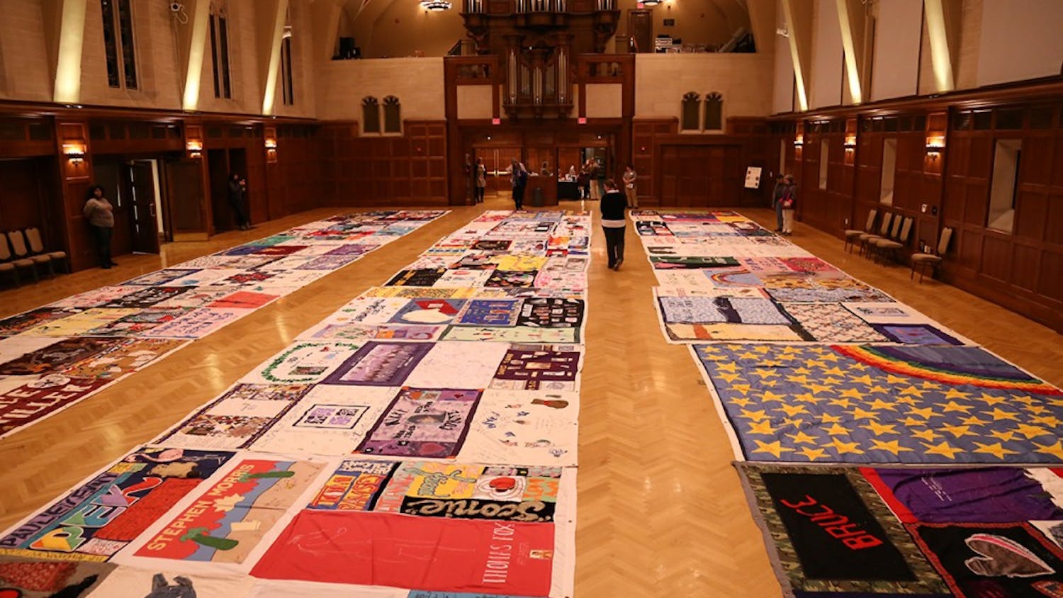 IU's AIDS Memorial Quilt Committee presents the 30th anniversary ceremony of the quilt on Tuesday in Alumni Hall. The committee spoke about the myths and facts of HIV.&nbsp;