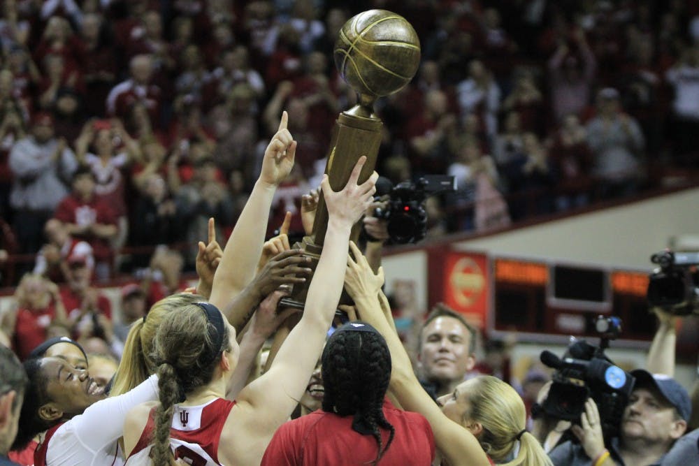<p>The IU women&#x27;s basketball team huddles March 31, 2018, with the WNIT trophy after defeating Virginia Polytechnic Institute and State University. The 2018 women&#x27;s basketball season ended with a win March 31.</p>