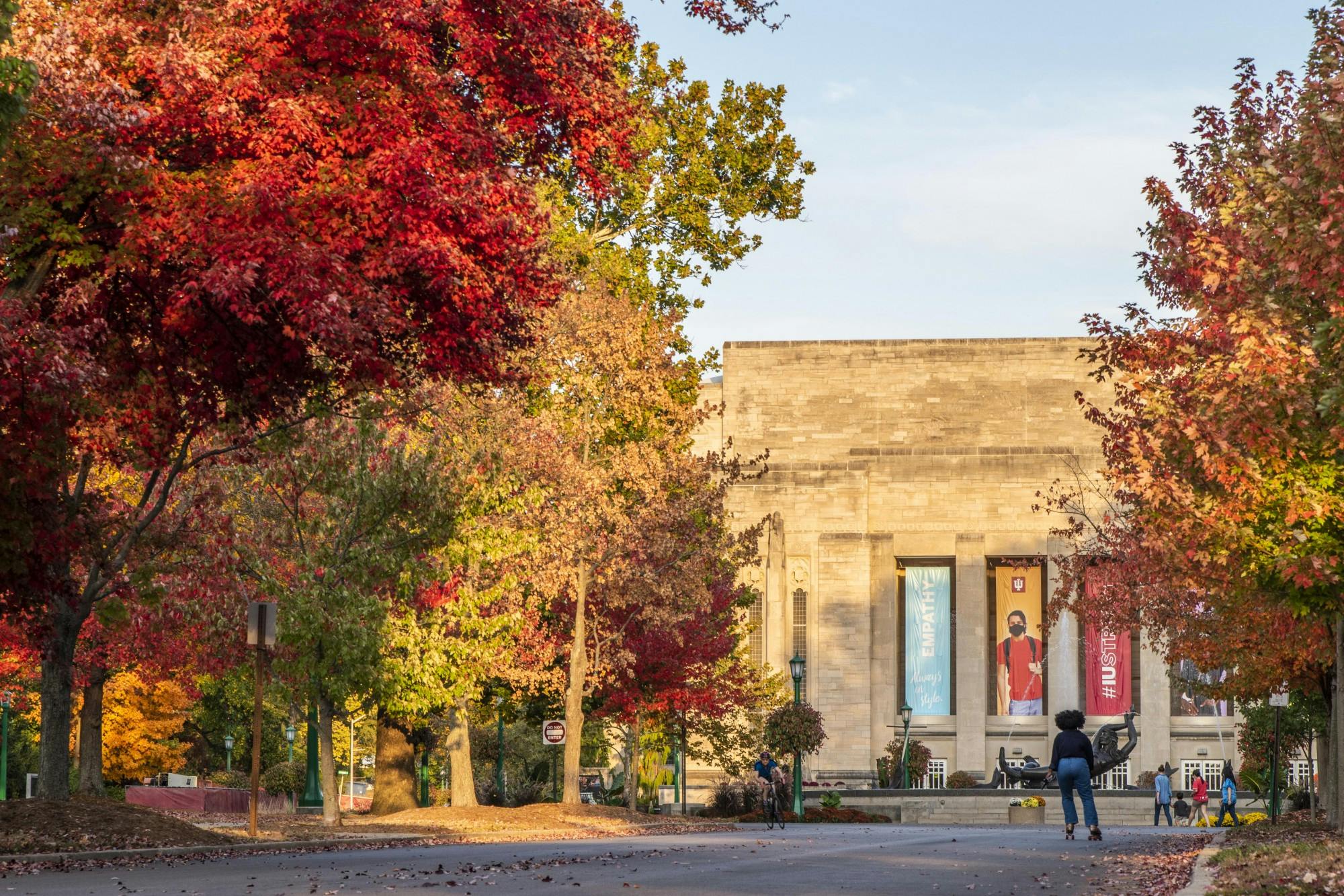 People walk, bike and rollerskate Oct. 10 around Showalter Fountain