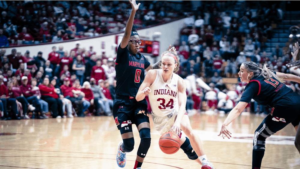 Senior guard Grace Berger drives to the basket Jan. 12, 2023 at Simon Skjodt Assembly Hall in Bloomington, Indiana. The Hoosiers beat Maryland 68-61.