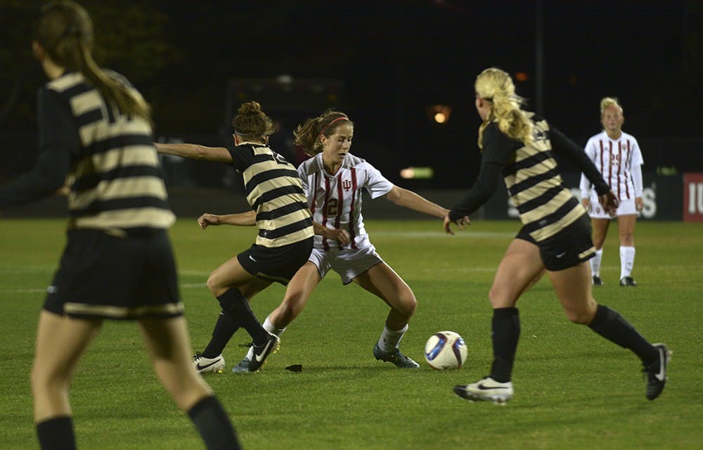 Senior Jessie Bujouves works her way through Purdue University's defense on Wednesday night. IU lost the game 2-0.