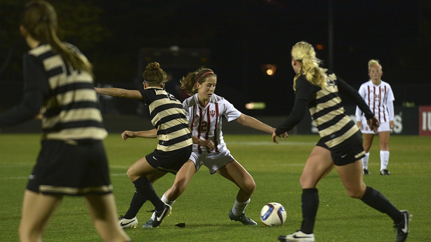 Senior Jessie Bujouves works her way through Purdue University's defense on Wednesday night. IU lost the game 2-0.