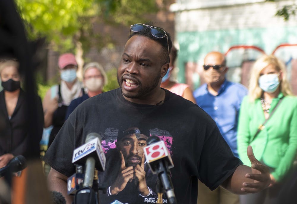 Vauhxx Booker speaks July 10 in Peoples Park. ”They targeted me, they attacked me, because they thought they could get away with it,” he said as he spoke on the attack that occurred July 4 near Monroe Lake.