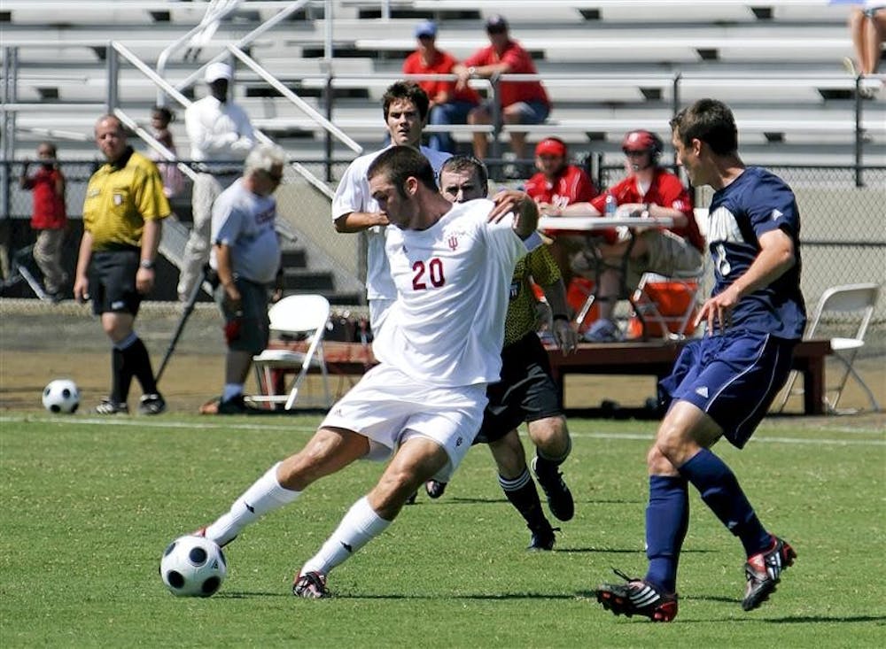 IU freshman Will Bruin crosses the ball against Akron on Aug. 31.  Bruin is one of five Hoosiers and four freshmen who come to Bloomington from the St. Louis area.