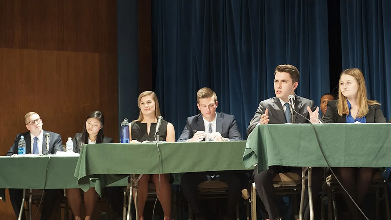 Andrew Ireland (second from right) from UNIFY for IUSA delivering his opening address at the IUSA ticket debate on Thursday evening at the Whittenberger auditorium in the IMU. Three tickets: Amplify for IUSA, INtouch for IUSA and UNIFY for IUSA were present as IU prepares for this year's IUSA elections. The debate was moderated by Bloomington Mayor Mark Kruzan.