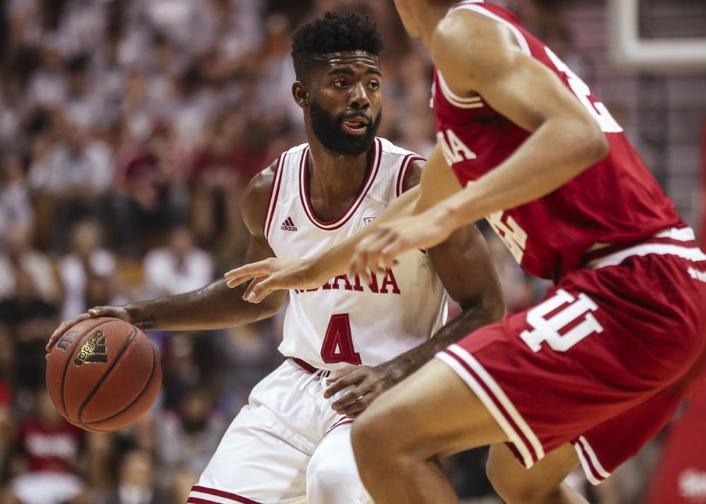 Senior guard Robert Johnson dribbles the ball during the Hoosier Hysteria scrimmage on Saturday.&nbsp;