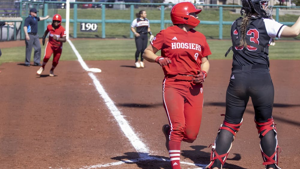 Freshman Taryn Kern crosses home plate for a run against IUPUI on March 6, 2023, at Andy Mohr Field.
